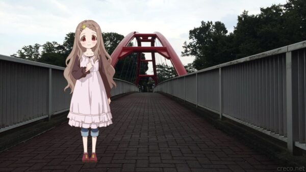 割岩橋の歩道、赤いアーチの欄干と煉瓦敷きの遊歩道